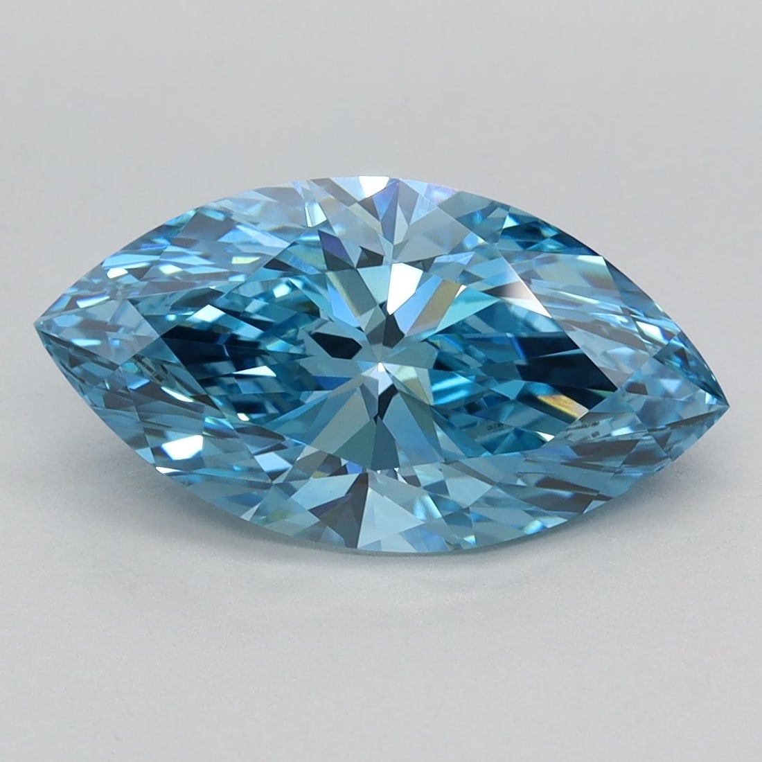 IGI Marquise 2.25ct Fancy Vivid Blue VVS2 Loose Lab Diamond: IGI Marquise 2.25ct Fancy Vivid Blue VVS2 Loose Lab Diamond Experience the rare beauty of a Fancy Vivid Blue diamond, one of the most elusive and coveted colors in nature. This stunning 2.25ct lab-gro