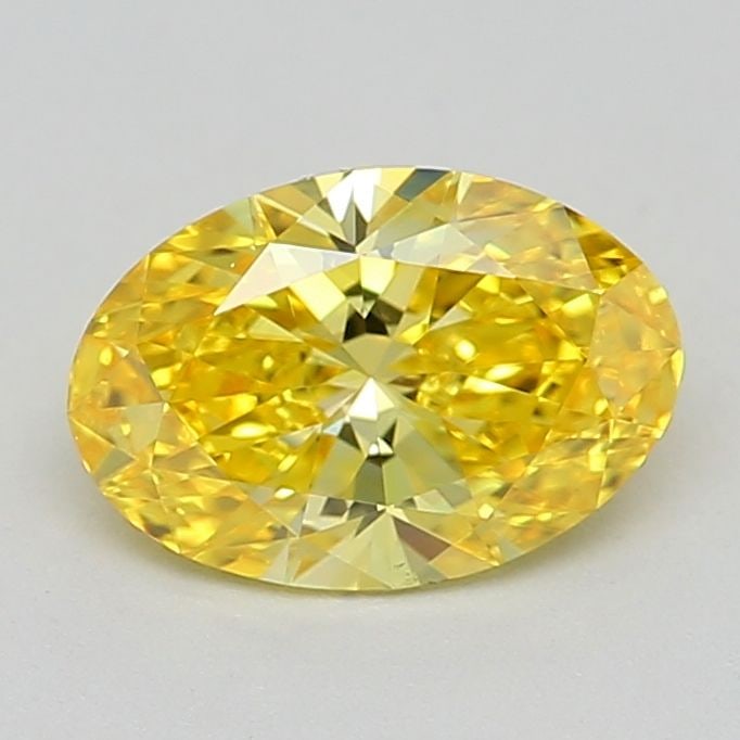 IGI Oval 0.52ct Fancy Vivid Yellow VVS1 Loose Lab Diamond: IGI Oval 0.52ct Fancy Vivid Yellow VVS1 Loose Lab Diamond Experience the brilliance of nature's own sunshine with this stunning 0.52ct Fancy Vivid Yellow VVS1 loose lab diamond, certified by the Inter