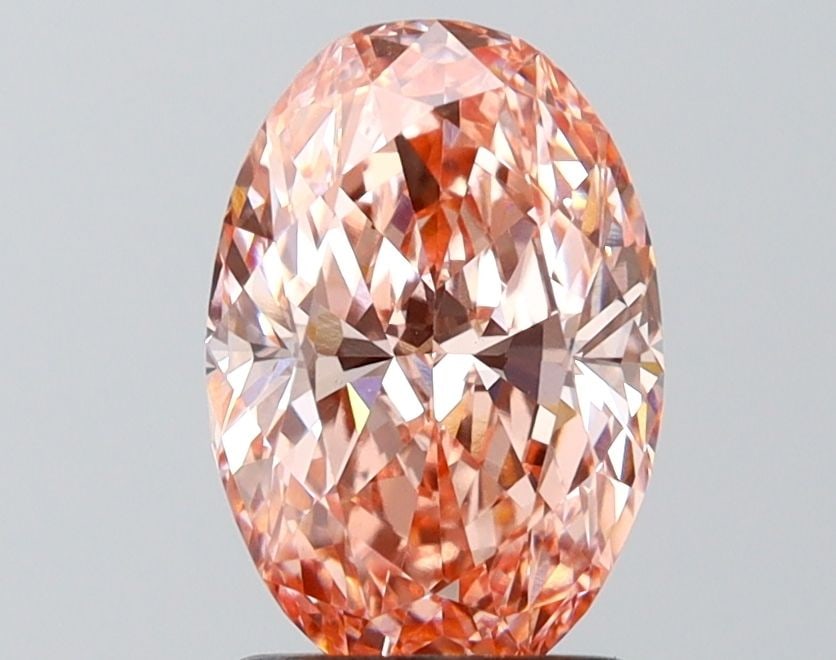 IGI Oval 2.06ct Fancy Vivid Pink VVS2 Loose Lab Diamond: IGI Oval 2.06ct Fancy Vivid Pink VVS2 Loose Lab Diamond Experience the rare beauty of a Fancy Vivid Pink lab diamond, boasting an exceptional 2.06ct cut with EX polish and VG symmetry. Certified by IG