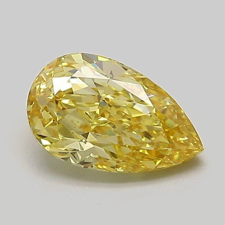 Loose Lab Diamond - IGI Pear 1.04ct Fancy Intense Yellow VVS2: Loose Lab Diamond - IGI Pear 1.04ct Fancy Intense Yellow VVS2 Experience the vibrant warmth of a genuine lab-grown diamond, boasting an exceptional 1.04 carat Fancy Intense Yellow color and VVS2 clari