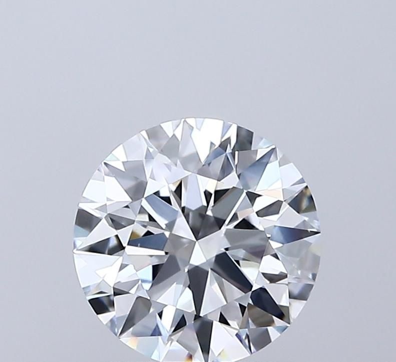 IGI Round 1.55ct D VVS2 Ideal Loose Lab Diamond: IGI Round 1.55ct D VVS2 Ideal Loose Lab Diamond Experience the beauty of a lab-grown diamond, certified by IGI as a 1.55ct D VVS2 Ideal Round, boasting exceptional clarity, color, and cut quality. Thi