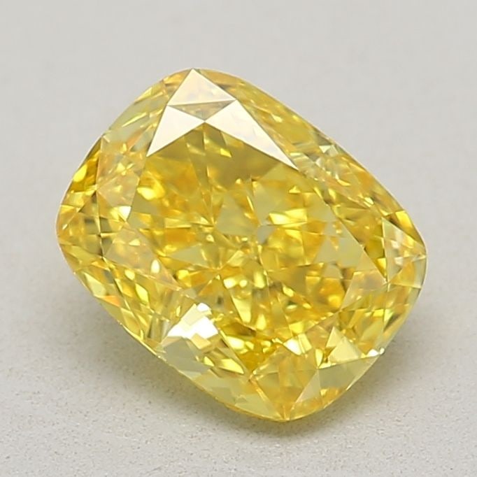 Loose Lab Diamond - IGI Cushion Modified 0.86ct Fancy Vivid Yellow VVS2: Loose Lab Diamond - IGI Cushion Modified 0.86ct Fancy Vivid Yellow VVS2 Experience the brilliance of nature's own sunshine with this exquisite 0.86ct Fancy Vivid Yellow Lab Diamond, certified by the I