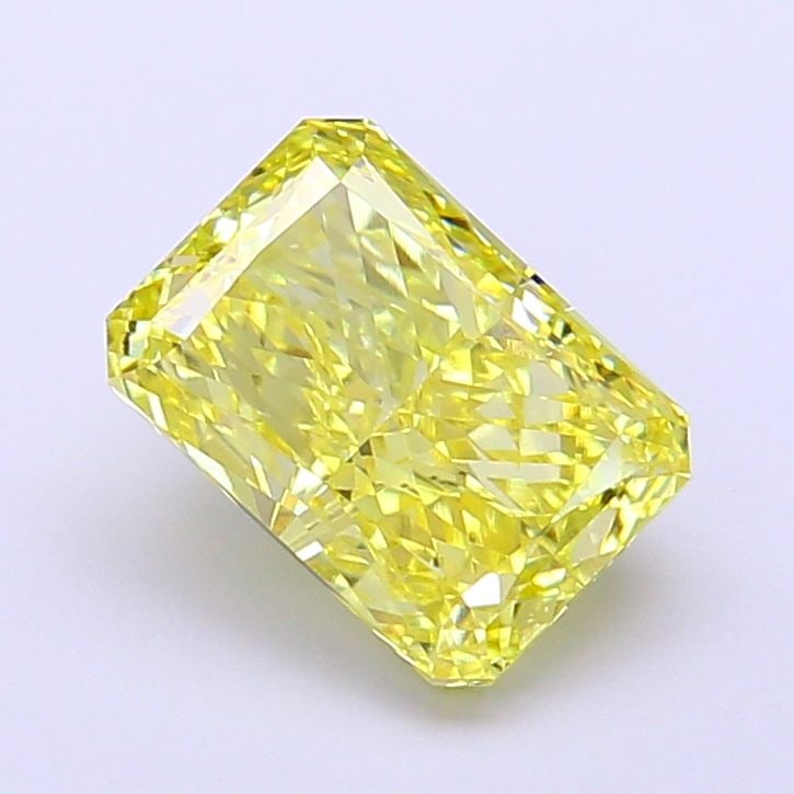 IGI Radiant 1.97ct Fancy Vivid Yellow VVS2 Diamond, Loose: IGI Radiant 1.97ct Fancy Vivid Yellow VVS2 Diamond, Loose Experience the unparalleled brilliance of a lab-grown Fancy Vivid Yellow diamond, certified by IGI and boasting exceptional clarity (VVS2), cu