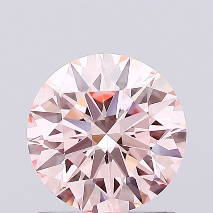 IGI Round 0.91ct Fancy Intense Pink VVS2 Ideal Loose Lab Diamond: IGI Round 0.91ct Fancy Intense Pink VVS2 Ideal Loose Lab Diamond Experience the rare beauty of a Fancy Intense Pink diamond, one of the most coveted colors in the world of gemstones. This exceptional