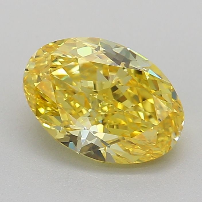 IGI Oval 0.84ct Fancy Vivid Yellow VVS1 Loose Lab Diamond: IGI Oval 0.84ct Fancy Vivid Yellow VVS1 Loose Lab Diamond Experience the beauty of nature with this stunning 0.84ct Fancy Vivid Yellow VVS1 loose lab diamond, certified by IGI and boasting exceptional