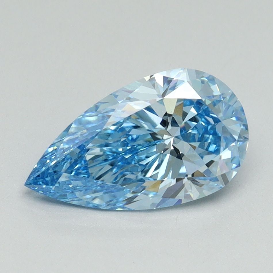 Loose Lab Diamond - IGI Pear 1.59ct Fancy Vivid Blue VVS2: Loose Lab Diamond - IGI Pear 1.59ct Fancy Vivid Blue VVS2 A stunning lab-grown diamond, certified by the International Gemological Institute (IGI), boasts an exceptional Fancy Vivid Blue color and VVS