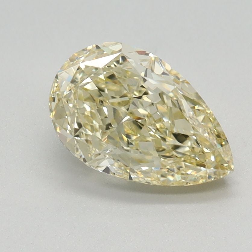 Loose Lab Diamond - IGI Pear 1.12ct Fancy Yellow VVS2: Loose Lab Diamond - IGI Pear 1.12ct Fancy Yellow VVS2 A rare and radiant Fancy Yellow Lab Diamond, certified by the International Gemological Institute (IGI), boasts exceptional clarity with a VVS2 gr