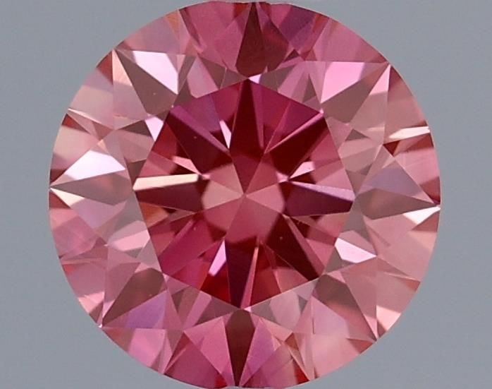 IGI Round 0.55ct Fancy Vivid Pink VVS2 Loose Lab Diamond: IGI Round 0.55ct Fancy Vivid Pink VVS2 Loose Lab Diamond This stunning 0.55ct Fancy Vivid Pink VVS2 loose lab diamond is a true gem, boasting exceptional clarity and color that shines with vibrant int