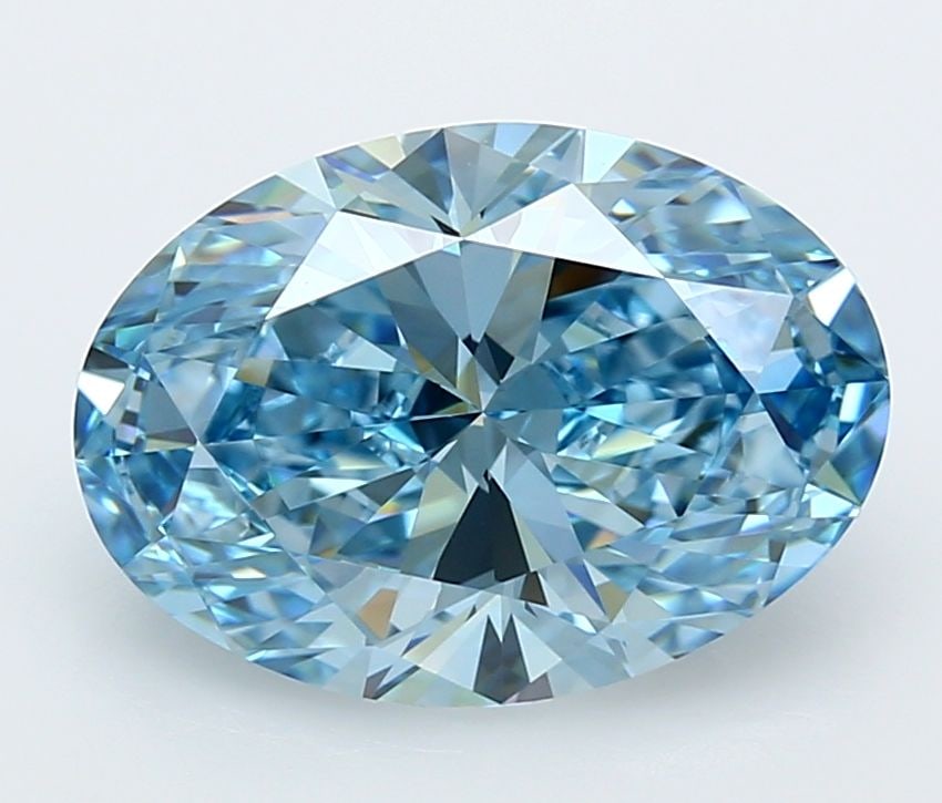 IGI Oval 4.97ct Fancy Vivid Blue VVS1 Loose Lab Diamond: IGI Oval 4.97ct Fancy Vivid Blue VVS1 Loose Lab Diamond Experience the breathtaking beauty of a lab-grown Fancy Vivid Blue diamond, certified by IGI as VVS1 clarity and boasting an EX polish and symme