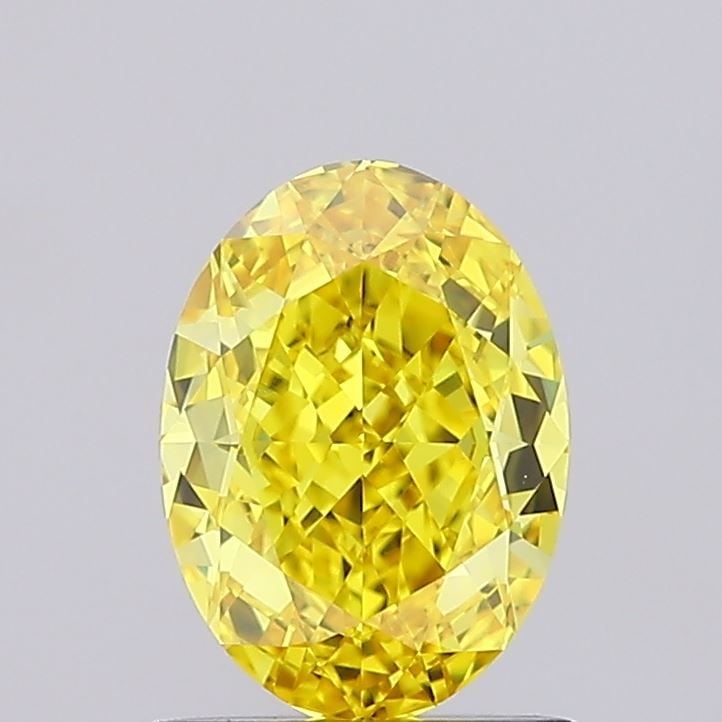 IGI Oval 1.24ct Fancy Vivid Yellow VVS1 Loose Lab Diamond: IGI Oval 1.24ct Fancy Vivid Yellow VVS1 Loose Lab Diamond Experience the vibrant beauty of nature in a lab-grown diamond, certified by IGI as a Fancy Vivid Yellow VVS1, boasting exceptional clarity an