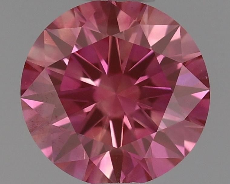 IGI Round 0.53ct Fancy Vivid Pink VVS2 Loose Lab Diamond: IGI Round 0.53ct Fancy Vivid Pink VVS2 Loose Lab Diamond This exquisite Fancy Vivid Pink lab diamond boasts exceptional clarity and color, with a VVS2 grade that ensures maximum brilliance. Its EX cut