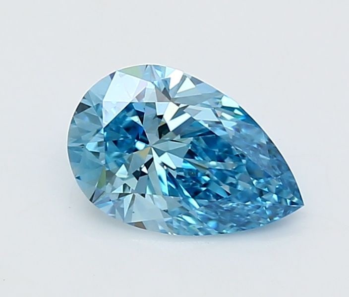 Loose Lab Diamond - IGI Pear 1.25ct Fancy Vivid Blue VVS2: Loose Lab Diamond - IGI Pear 1.25ct Fancy Vivid Blue VVS2 Experience the breathtaking beauty of a lab-grown diamond, certified by the International Gemological Institute (IGI) as Fancy Vivid Blue with