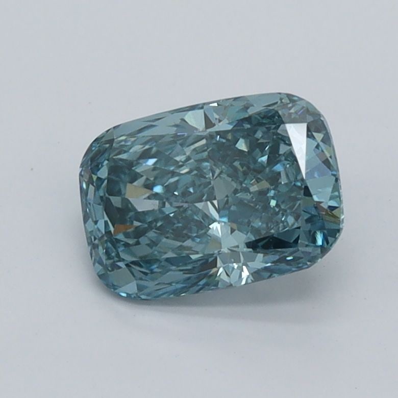 Loose Lab Diamond - IGI Cushion Modified 1.01ct Fancy Vivid Blue VVS1: Loose Lab Diamond - IGI Cushion Modified 1.01ct Fancy Vivid Blue VVS1 Experience the unparalleled beauty of a lab-grown diamond, certified by IGI as Fancy Vivid Blue with exceptional clarity and polis