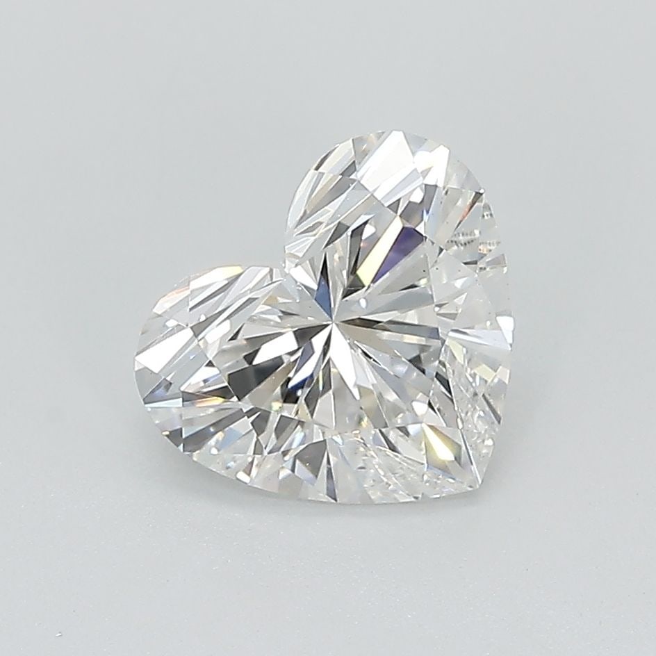 IGI Heart 3.23ct E VVS2 Loose Lab Diamond: IGI Heart 3.23ct E VVS2 Loose Lab Diamond Experience the brilliance of a lab-grown diamond, certified by IGI as E color, VVS2 clarity, and EX polish and symmetry. This stunning 3.23ct gem boasts excep