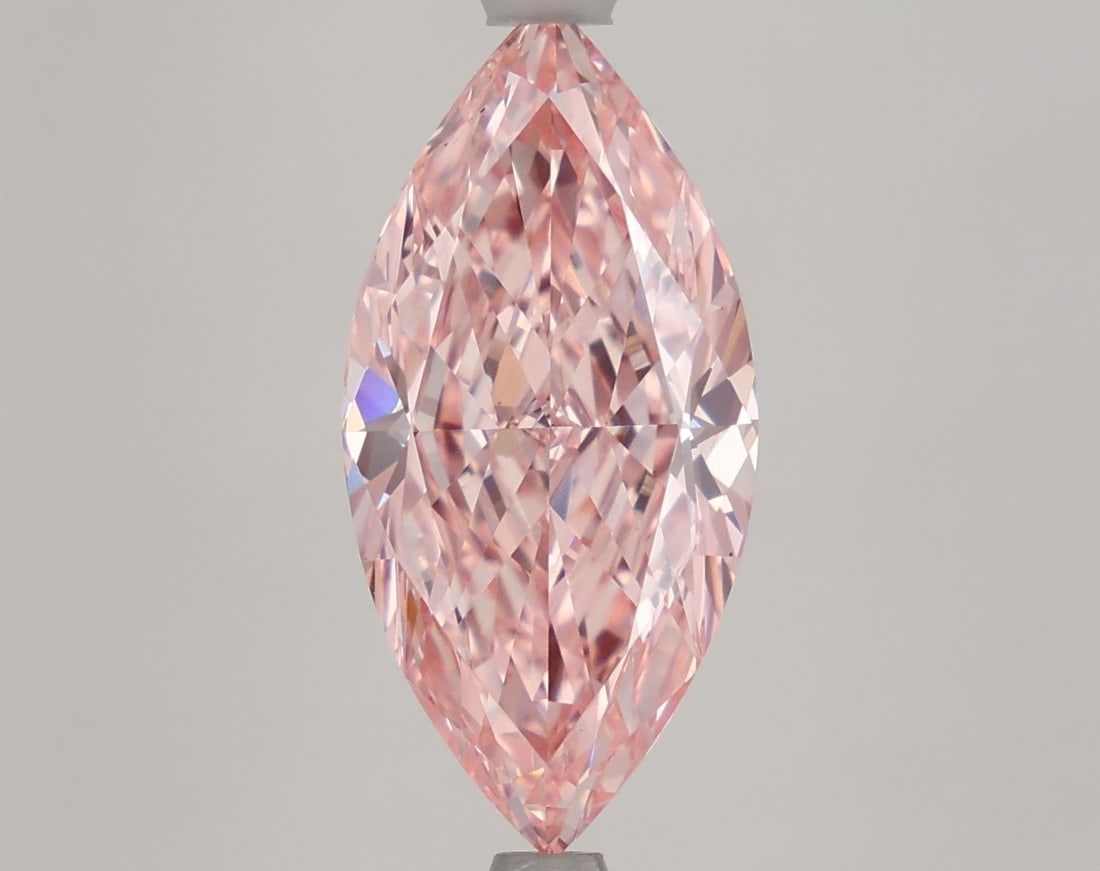 IGI Marquise 4.03ct Fancy Vivid Pink VVS2 Loose Lab Diamond: IGI Marquise 4.03ct Fancy Vivid Pink VVS2 Loose Lab Diamond Experience the rare beauty of a Fancy Vivid Pink diamond, one of the most coveted colors in the world of gemstones. This exquisite 4.03ct la