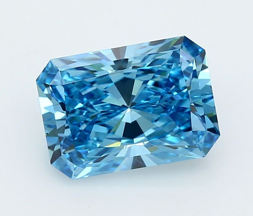 IGI Radiant 3.02ct Fancy Vivid Blue VVS2 Loose Lab Diamond: IGI Radiant 3.02ct Fancy Vivid Blue VVS2 Loose Lab Diamond Experience the breathtaking beauty of a Fancy Vivid Blue lab diamond, certified by IGI as 3.02 carats in exceptional clarity (VVS2) and cut (