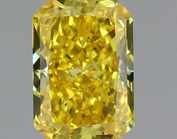 IGI Radiant 0.55ct Fancy Vivid Yellow VVS2 Loose Lab Diamond: IGI Radiant 0.55ct Fancy Vivid Yellow VVS2 Loose Lab Diamond Experience the brilliance of nature in a lab-grown diamond, certified by IGI as Fancy Vivid Yellow with exceptional clarity and polish. Thi