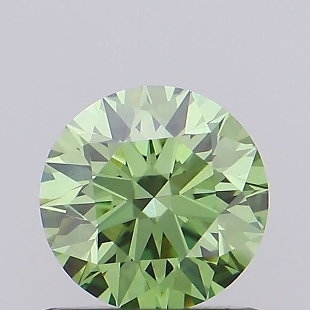 IGI Round 0.94ct Fancy Vivid Green VVS2 Loose Lab Diamond: IGI Round 0.94ct Fancy Vivid Green VVS2 Loose Lab Diamond Experience the rare beauty of a Fancy Vivid Green lab-grown diamond, boasting exceptional clarity (VVS2) and a vibrant green hue that's truly