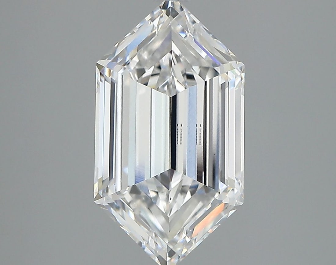 IGI Hexagonal 3.2ct E VVS2 Loose Lab Diamond: IGI Hexagonal 3.2ct E VVS2 Loose Lab Diamond Experience the brilliance of a lab-grown diamond, certified by IGI as a 3.2ct E VVS2, EX polished gemstone with exceptional symmetry and clarity. This rare