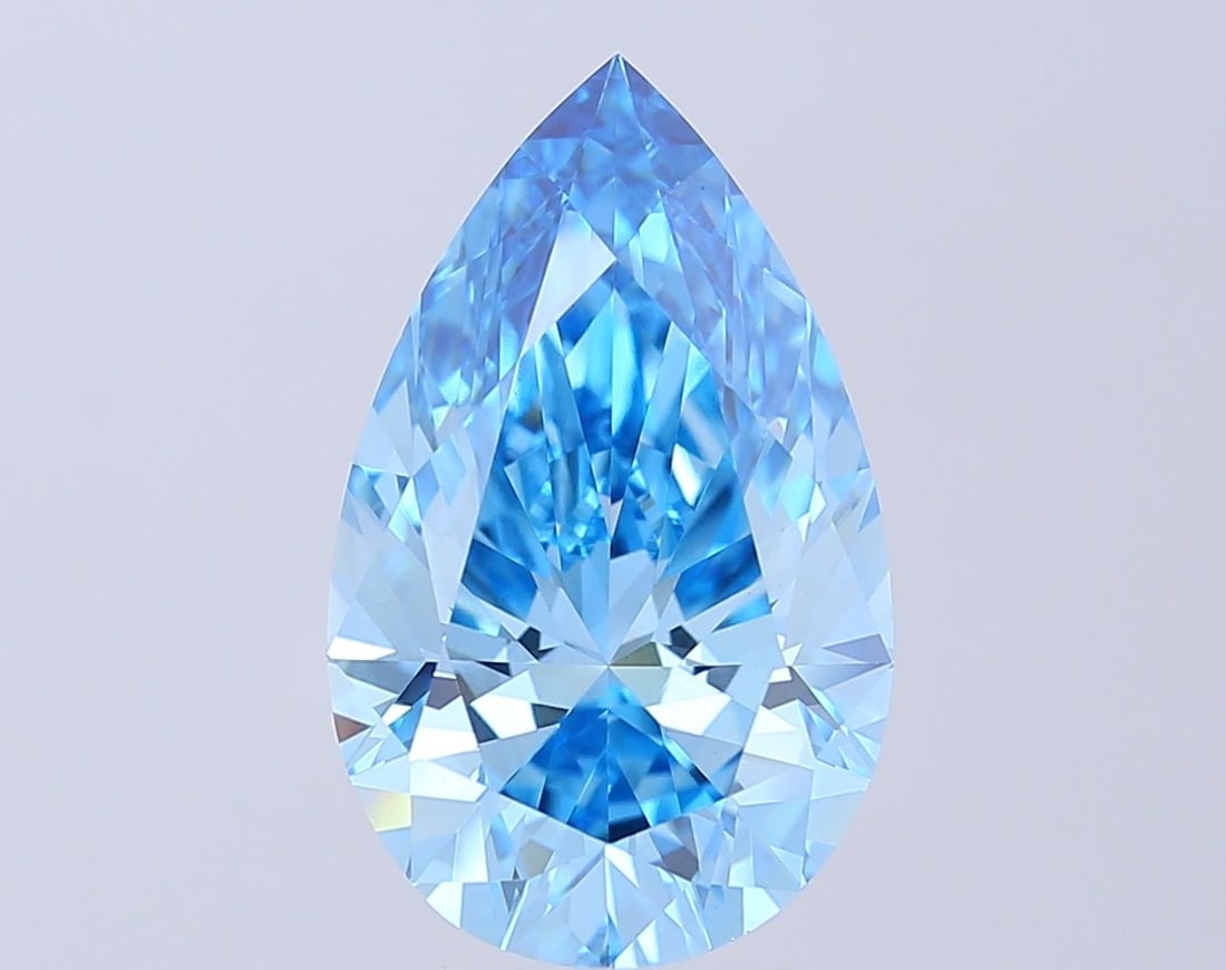 Loose Lab Diamond - IGI Pear 6.06ct Fancy Vivid Blue VVS2: Loose Lab Diamond - IGI Pear 6.06ct Fancy Vivid Blue VVS2 Experience the breathtaking beauty of a lab-grown diamond, certified by IGI as Fancy Vivid Blue with exceptional clarity and polish. This stun