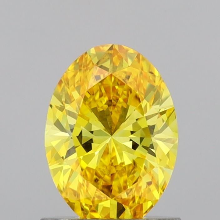 IGI Oval 1.0ct Fancy Vivid Yellow VVS1 Loose Lab Diamond: IGI Oval 1.0ct Fancy Vivid Yellow VVS1 Loose Lab Diamond A standout among lab-grown diamonds, this 1.0ct Fancy Vivid Yellow VVS1 Loose Lab Diamond boasts exceptional clarity and color, making it a rar