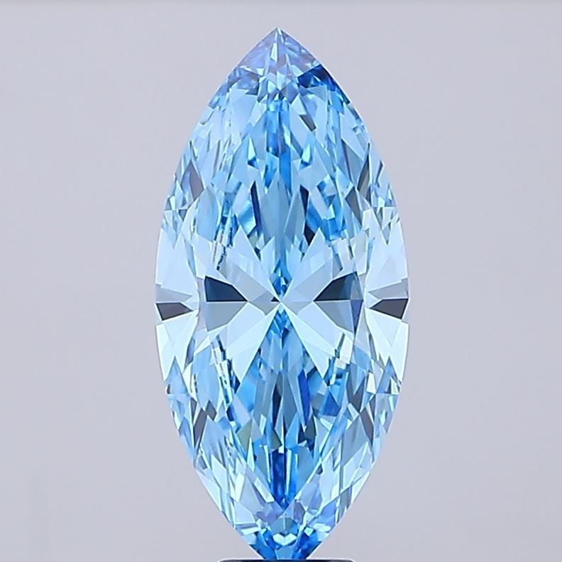 IGI Marquise 9.04ct Fancy Vivid Blue VVS2 Loose Lab Diamond: IGI Marquise 9.04ct Fancy Vivid Blue VVS2 Loose Lab Diamond Experience the rare beauty of a Fancy Vivid Blue diamond, one of the most elusive and coveted colors in nature. This exquisite 9.04ct lab-gr