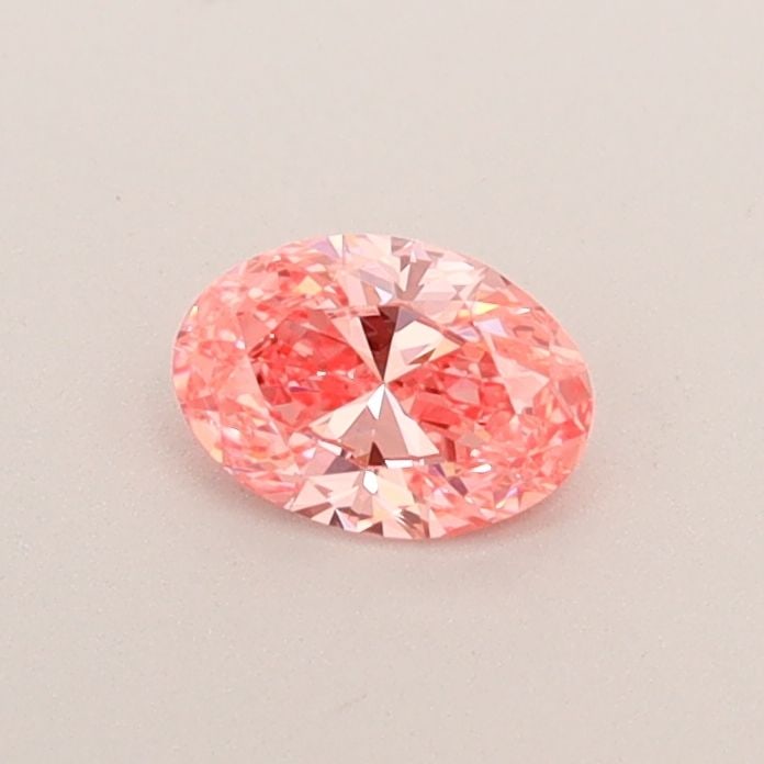 IGI Oval 0.31ct Fancy Vivid Pink VVS2 Loose Lab Diamond: IGI Oval 0.31ct Fancy Vivid Pink VVS2 Loose Lab Diamond Experience the breathtaking beauty of this 0.31ct Fancy Vivid Pink lab-grown diamond, certified by the International Gemological Institute (IGI)