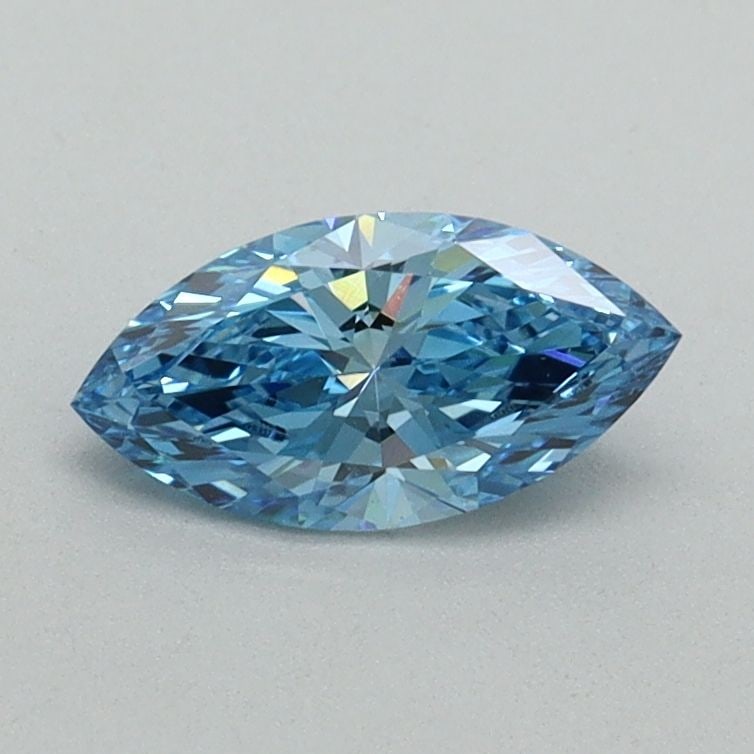 IGI Marquise 0.52ct Fancy Vivid Blue VVS2 Loose Lab Diamond: IGI Marquise 0.52ct Fancy Vivid Blue VVS2 Loose Lab Diamond Experience the rare beauty of a Fancy Vivid Blue diamond, one of the most striking and sought-after colors in the world of gemstones. This e