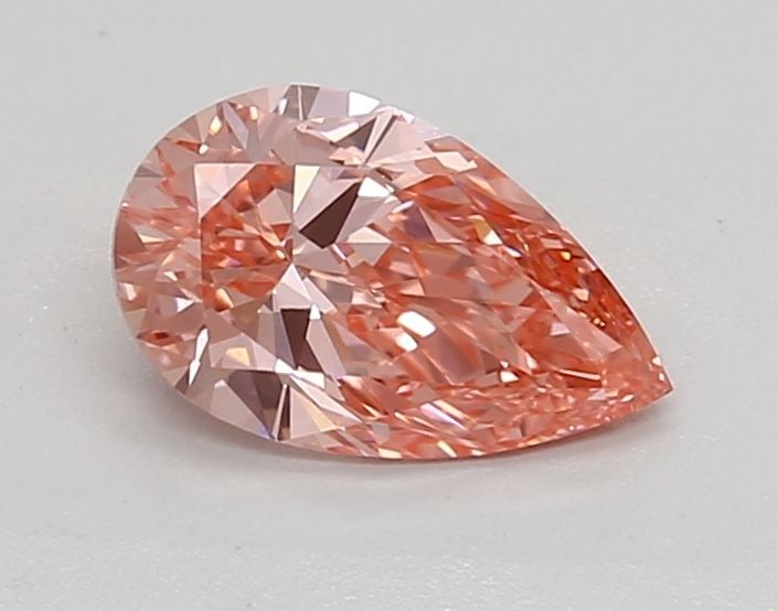 Loose Lab Diamond - IGI Pear 0.82ct Fancy Vivid Pink VVS1: Loose Lab Diamond - IGI Pear 0.82ct Fancy Vivid Pink VVS1 Experience the unparalleled beauty of a lab-grown diamond, certified by the International Gemological Institute (IGI) as a Fancy Vivid Pink ge