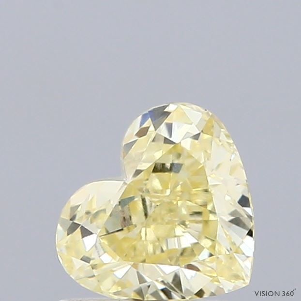 Loose Lab Diamond - IGI Heart 1.07ct Fancy Yellow VVS2: Loose Lab Diamond - IGI Heart 1.07ct Fancy Yellow VVS2 A rare and radiant gem, this 1.07ct Fancy Yellow Lab Diamond boasts exceptional clarity (VVS2) and polish (EX), giving it a dazzling brilliance