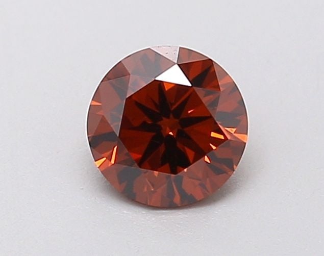 IGI Round 0.58ct Fancy Vivid Orange VVS2 Loose Lab Diamond: IGI Round 0.58ct Fancy Vivid Orange VVS2 Loose Lab Diamond Experience the vibrant beauty of a Fancy Vivid Orange lab diamond, boasting an EX cut and VVS2 clarity for exceptional brilliance and fire. T