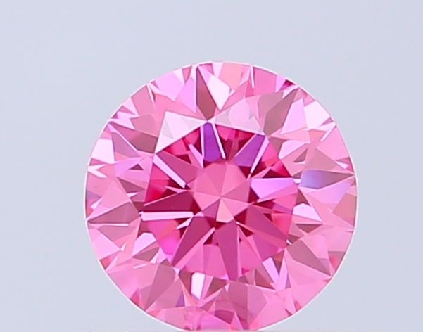 IGI Round 0.55ct Fancy Vivid Pink VVS2 Ideal Loose Lab Diamond: IGI Round 0.55ct Fancy Vivid Pink VVS2 Ideal Loose Lab Diamond Experience the unparalleled beauty of a lab-grown diamond, certified by IGI as Fancy Vivid Pink with exceptional clarity and cut. This