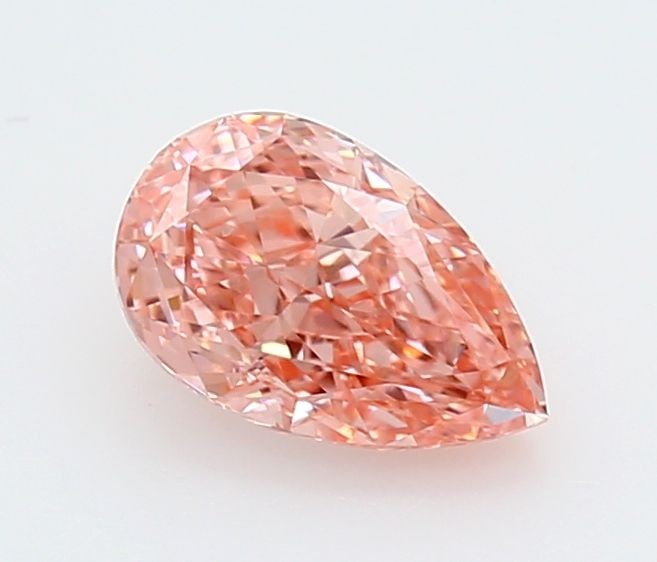 Loose Lab Diamond - IGI Pear 1.01ct Fancy Vivid Pink VVS2: Loose Lab Diamond - IGI Pear 1.01ct Fancy Vivid Pink VVS2 Experience the rare beauty of a lab-grown diamond, certified by IGI as a Fancy Vivid Pink gemstone with exceptional clarity and cut. This 1.01