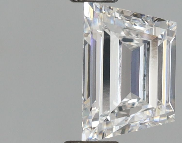 IGI Trapezoid 0.88ct D VVS2 Loose Lab Diamond: IGI Trapezoid 0.88ct D VVS2 Loose Lab Diamond Experience the beauty of a lab-grown diamond, certified by IGI as VVS2 clarity and D color, with exceptional cut symmetry. This stunning 0.88ct trapezoid