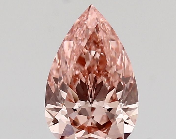 Loose Lab Diamond - IGI Pear 1.01ct Fancy Vivid Pink VVS2: Loose Lab Diamond - IGI Pear 1.01ct Fancy Vivid Pink VVS2 Experience the unparalleled beauty of a lab-grown diamond, certified by IGI as Fancy Vivid Pink in VVS2 clarity and EX polish. This stunning 1