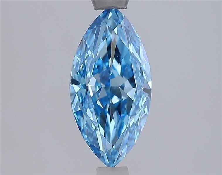 IGI Marquise 1.54ct Fancy Vivid Blue VVS2 Loose Lab Diamond: IGI Marquise 1.54ct Fancy Vivid Blue VVS2 Loose Lab Diamond Experience the rare beauty of a Fancy Vivid Blue diamond, one of the most coveted colors in the world of gemstones. This stunning 1.54ct lab