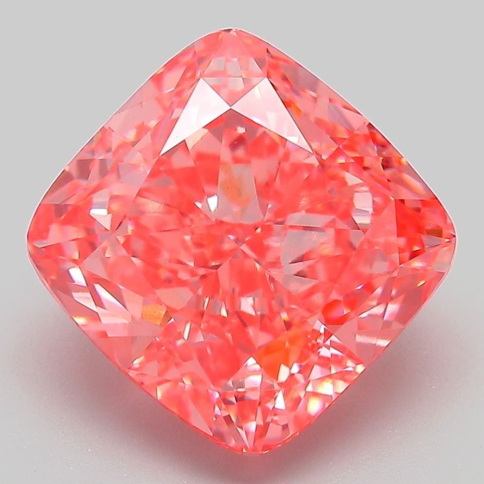IGI Cushion Modified 6.54ct Fancy Vivid Pink VVS2 Loose Lab Diamond: IGI Cushion Modified 6.54ct Fancy Vivid Pink VVS2 Loose Lab Diamond Experience the breathtaking beauty of a Fancy Vivid Pink diamond, one of the rarest and most coveted colors in nature. This