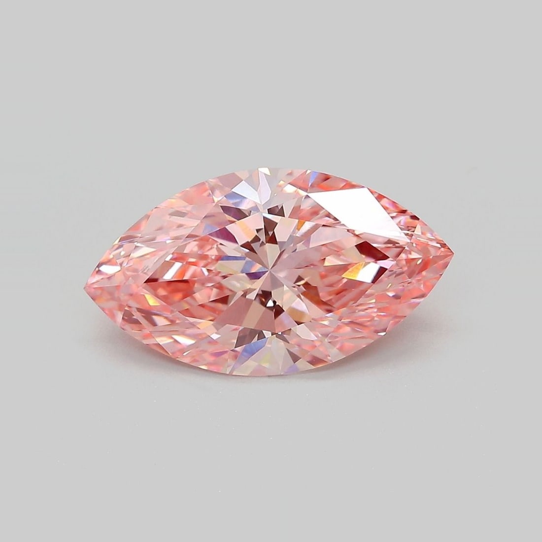 IGI Marquise 3.78ct Fancy Vivid Pink VVS2 Loose Lab Diamond: IGI Marquise 3.78ct Fancy Vivid Pink VVS2 Loose Lab Diamond This exquisite IGI certified fancy vivid pink lab diamond boasts an impressive 3.78 carats of vibrant, cushion-cut beauty. Its exceptional c
