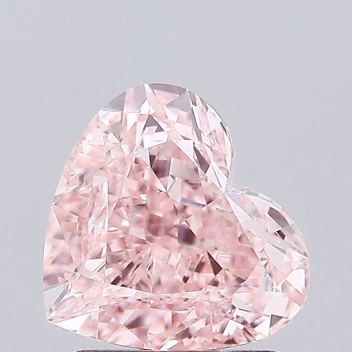 Loose Lab Diamond - IGI Heart 1.68ct Fancy Vivid Pink VVS2: Loose Lab Diamond - IGI Heart 1.68ct Fancy Vivid Pink VVS2 A true gem for the modern collector, this 1.68ct Fancy Vivid Pink lab diamond boasts exceptional clarity and cut, with a VVS2 grade that shin