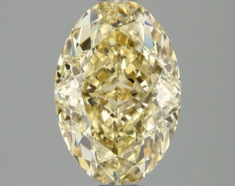 IGI Oval 2.07ct Fancy Intense Yellow VVS2 Loose Lab Diamond: IGI Oval 2.07ct Fancy Intense Yellow VVS2 Loose Lab Diamond Experience the vibrant beauty of nature in a lab-grown diamond, certified by IGI as Fancy Intense Yellow with exceptional clarity and cut. T