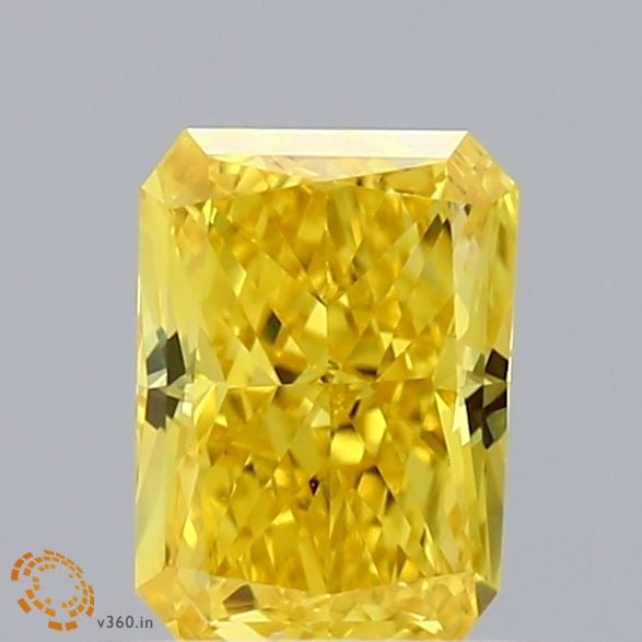 IGI Radiant 0.6ct Fancy Vivid Yellow VVS2 Loose Lab Diamond: IGI Radiant 0.6ct Fancy Vivid Yellow VVS2 Loose Lab Diamond Experience the brilliance of nature's own sunshine with this stunning 0.6ct Fancy Vivid Yellow VVS2 loose lab diamond, certified by the Inte