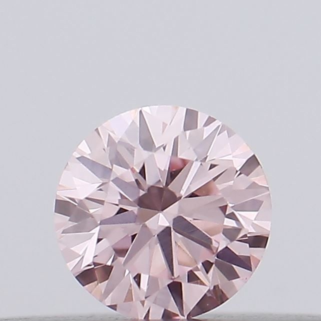 IGI Round 0.13ct Fancy Intense Pink VVS2 Loose Lab Diamond: IGI Round 0.13ct Fancy Intense Pink VVS2 Loose Lab Diamond Experience the rare beauty of a Fancy Intense Pink diamond, one of the most coveted colors in the world of gemstones. This stunning 0.13ct la