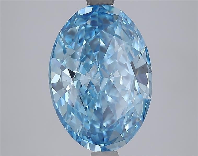 IGI Oval 3.54ct Fancy Vivid Blue VVS2 Loose Lab Diamond: IGI Oval 3.54ct Fancy Vivid Blue VVS2 Loose Lab Diamond Experience the rare beauty of a Fancy Vivid Blue diamond, one of the most elusive and coveted colors in nature. This stunning 3.54ct lab-grown g