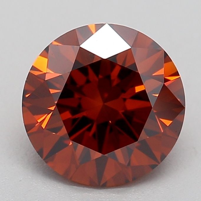 IGI Round 0.94ct Fancy Deep Orange VVS2 Loose Lab Diamond: IGI Round 0.94ct Fancy Deep Orange VVS2 Loose Lab Diamond Experience the vibrant beauty of nature's own masterpiece, as this stunning Fancy Deep Orange VVS2 loose lab diamond shines with unparalleled