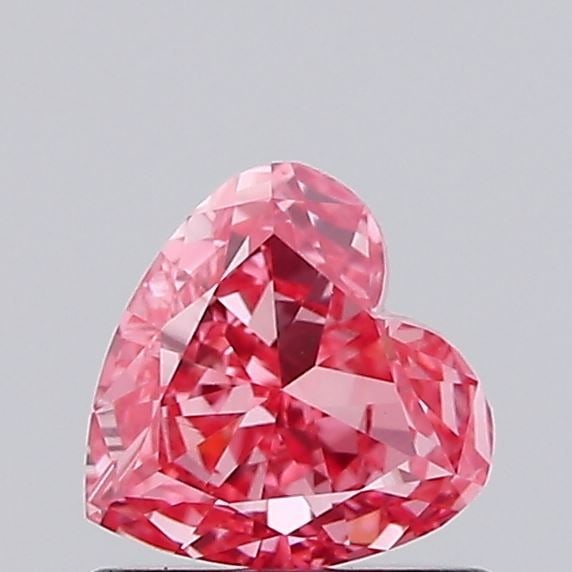 IGI Heart 0.66ct Fancy Vivid Pink VVS2 Loose Lab Diamond: IGI Heart 0.66ct Fancy Vivid Pink VVS2 Loose Lab Diamond Experience the rare beauty of a Fancy Vivid Pink diamond, one of the most coveted colors in the world of gemstones. This stunning 0.66ct lab-gr