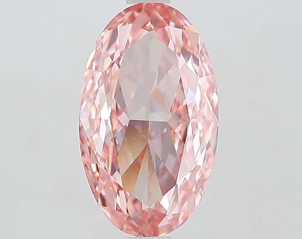 IGI Oval 2.81ct Fancy Vivid Pink VVS2 Loose Lab Diamond: IGI Oval 2.81ct Fancy Vivid Pink VVS2 Loose Lab Diamond Experience the unparalleled beauty of a lab-grown diamond, certified by IGI as Fancy Vivid Pink with exceptional clarity and cut. This stunning
