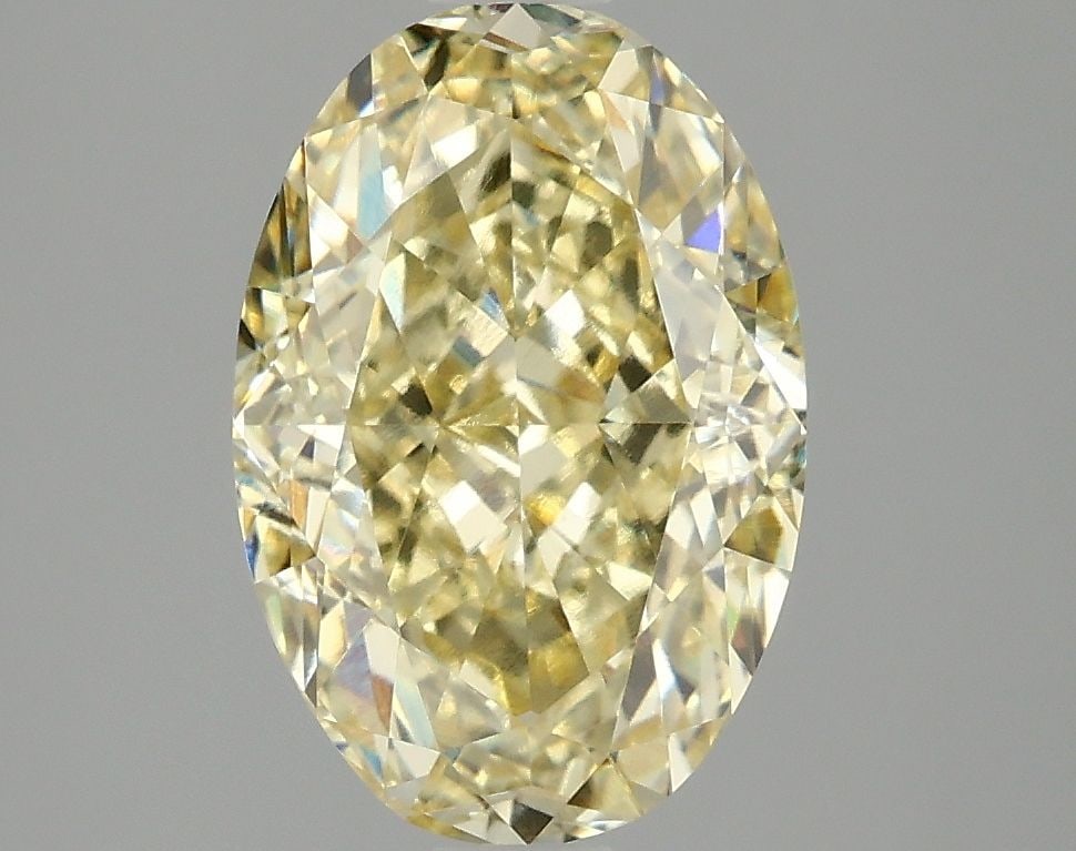 IGI Oval 3.1ct Fancy Intense Yellow VVS2 Loose Lab Diamond: IGI Oval 3.1ct Fancy Intense Yellow VVS2 Loose Lab Diamond Experience the vibrant beauty of nature in this stunning 3.1ct Fancy Intense Yellow VVS2 lab-grown diamond, certified by IGI and boasting exc