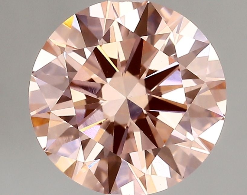 IGI Round 2.99ct Fancy Vivid Pink VVS2 Loose Lab Diamond: IGI Round 2.99ct Fancy Vivid Pink VVS2 Loose Lab Diamond Experience the beauty of a lab-grown diamond, certified by IGI as Fancy Vivid Pink, VVS2, and EX cut. This stunning 2.99ct gem boasts