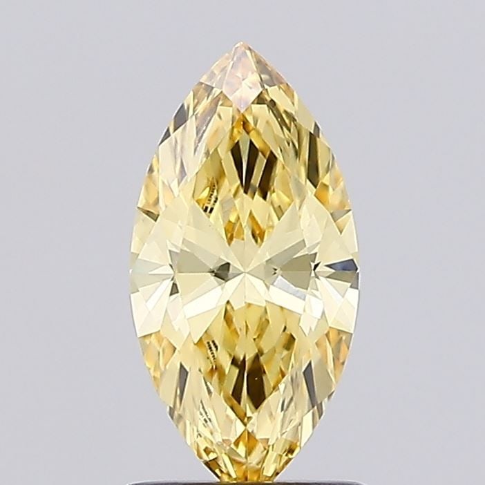 IGI Marquise 1.0ct Fancy Vivid Yellow VVS2 Loose Lab Diamond: IGI Marquise 1.0ct Fancy Vivid Yellow VVS2 Loose Lab Diamond Experience the vibrant beauty of nature with this stunning 1.0ct Fancy Vivid Yellow VVS2 lab-grown diamond, certified by IGI and boasting e