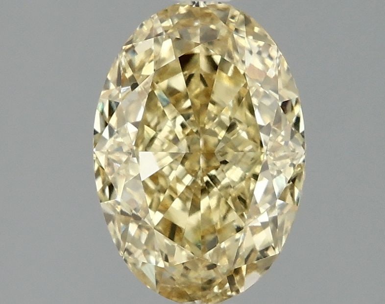 IGI Oval 2.03ct Fancy Vivid Yellow VVS2 Loose Lab Diamond: IGI Oval 2.03ct Fancy Vivid Yellow VVS2 Loose Lab Diamond A true gem for the discerning collector, this 2.03ct Fancy Vivid Yellow VVS2 loose lab diamond boasts exceptional clarity and color, with a me